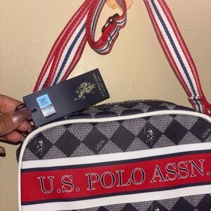 U.S. Polo Assn. Black and Red Duffel Bag with Sporty Design